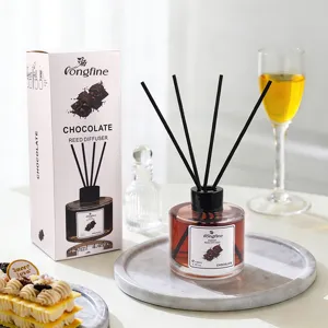 Chocolate reed diffuser set with glass bottle and black aroma sticks for home fragrance.