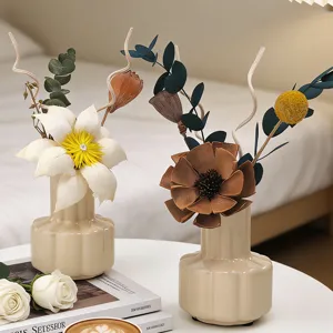 Botellas difusoras de aromaterapia de ceramica nordica con flores secas para decoracion del hogar.