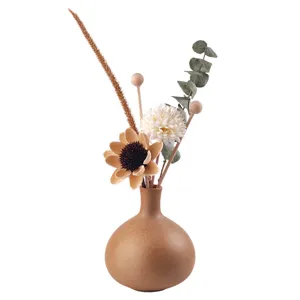 Set vaso per aromi in ceramica con fiori secchi e bastoncini di legno per decorazione casa