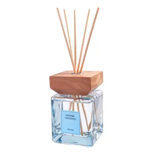 500ml glass reed diffuser set for home and hotel room indoor fragrance with wooden cap.