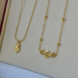 Gold-plated stainless steel flower and heart necklaces for women in jewelry box