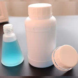 Car air freshener refill liquid set with white plastic bottle and blue aroma bottle.