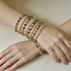 Stacked colorful zircon stainless steel bracelets with mixed heart and oval shapes on wrist