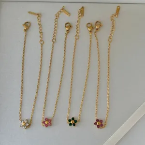 18k gold plated titanium steel flower necklaces in four vibrant colors with crystal petals