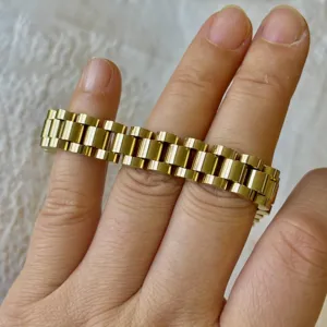Macro detail of 10mm titanium steel watchband bracelet with 18K gold vacuum plating