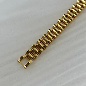 Macro view of 10mm 18K gold vacuum plated stainless steel link watch strap bracelet