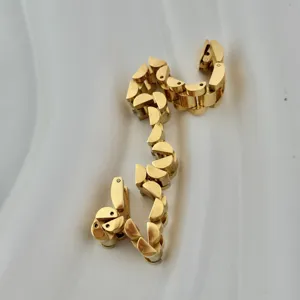 10mm titanium steel watch-strap style 18K gold-plated bracelet with minimalist design.