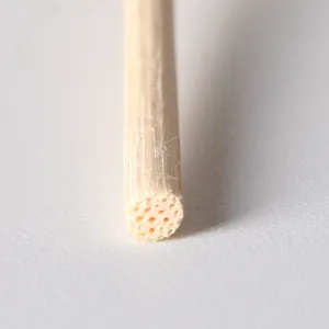 Macro detail of natural porous reed diffuser stick for essential oil aromatherapy