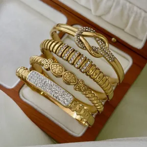 Luxury 18k gold-plated stainless steel knotted and stone-encrusted bangles set in box