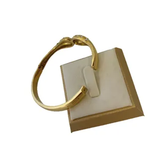 Bracelet jonc en acier inoxydable doré avec strass