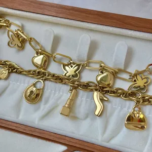 Elegante 18K vergulde roestvrijstalen bedelarmbanden met vlinder en hart hangers