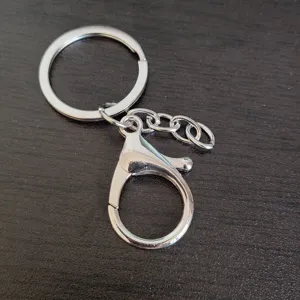 Metal keychain with flat key ring, four section chain and lobster clasp for DIY crafts.