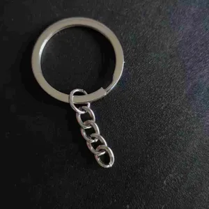 Close-up detail of silver metal flat keyring with four-link chain for diy crafts accessories