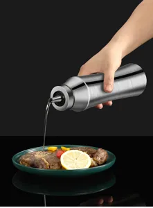 Stainless steel oil dispenser bottle, 304 leak-proof kitchen cruet for cooking and seasoning.