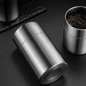 Stainless steel tea canister, sealed food storage jar, metal kitchen canister for dry goods.
