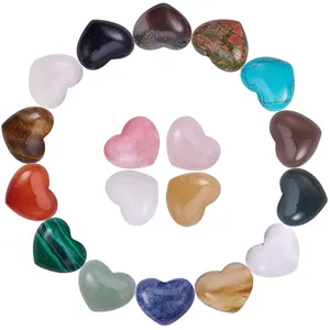 Detailed view of multi-colored heart-shaped polished natural crystal stones for decor.