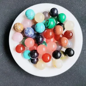 Detailed macro view of colorful 8mm two-tone jelly glass beads in a white dish