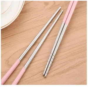 Bacchette in metallo e acciaio inossidabile dettaglio manico rosa utensili cucina casa