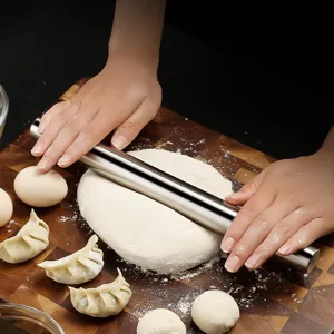 Stainless steel rolling pin for baking, durable metal dough roller for kitchen pastry making.