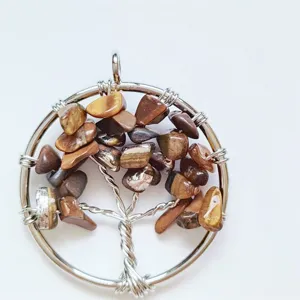 Handcrafted wire wrapped tree of life pendant necklace featuring natural gemstone crystal chips.