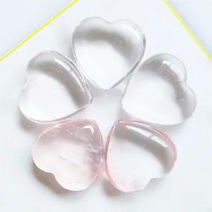 Detail shot of 3cm natural crystal heart ornaments, non-perforated rose quartz love stones.
