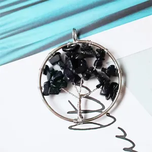 Handcrafted wire wrapped tree of life pendant necklace with blue stone crystal chips for women.