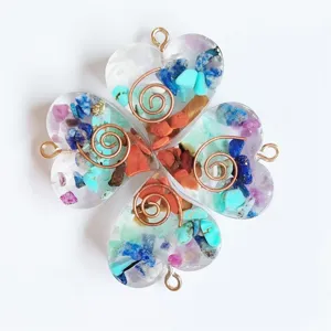 Seven chakra crystal crushed stone resin clover pendant with copper wire spiral jewelry.
