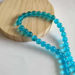 Translucent blue glass round beads for DIY handmade jewelry bracelets and necklaces.