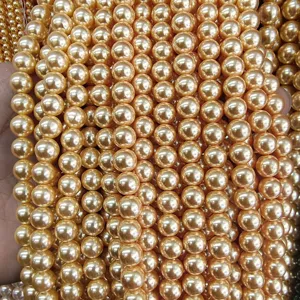 Cuentas de concha doradas redondas para hacer joyas de bricolaje collares y pulseras accesorios.