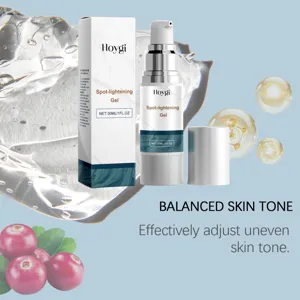 Hoygi Spot-lightening Gel with packaging and cranberry accents on a blue background.