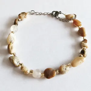 Natural irregular crystal stone bracelet for women with adjustable chain and metal bead accents.