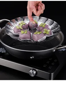 Cesta vaporera plegable de acero inoxidable para cocinar verduras y bollos en olla.