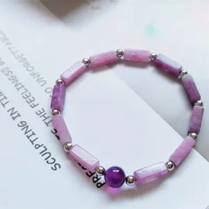 Natural purple crystal bracelet with rectangular beads and silver spacers, elegant fashion jewelry.