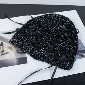 Fashionable black sequin knit beanie hat with elegant ribbon tie straps for women winter warm