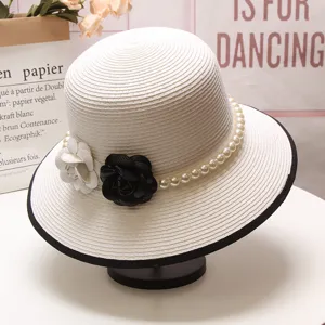Chapeau de paille rétro français perle camélia femmes protection solaire chapeau de bassin.