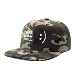 Camouflage flat brim baseball cap featuring embroidered city text and stylish smiley face design.