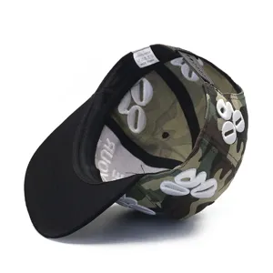 Detailed interior view of camouflage snapback hat with 3D embroidery and wash label