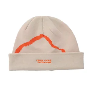 Detail view of beige knit beanie featuring orange mountain embroidery and brand text.