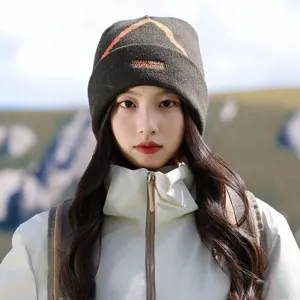 Close-up of a stylish women's knitted outdoor beanie for winter sports and hiking trips.