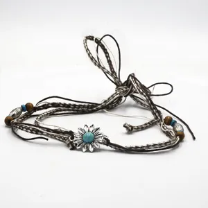 Vintage ethnic braided hat band accessory with turquoise flower and wooden beads boho style