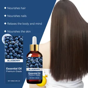 OUHOE blueberry essential oil for nourishing hair, skin, and nails, 100ml multi-use care.