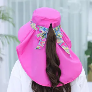 Pink summer sun protection hat with wide brim, neck flap and ponytail hole for outdoor travel.