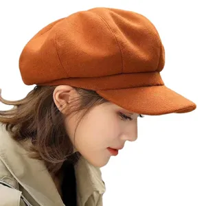 Women's orange wool newsboy cap, stylish baker boy hat for autumn and winter daily wear.