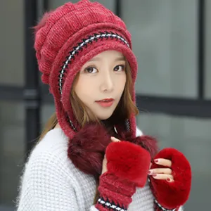 Damen Winter Strickmütze mit Ohrenklappen und Plüsch Bommel süß warm dick kuschelige Haube