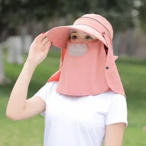 Detailed view of the women's pink sun protection hat featuring a wide brim and face shield.