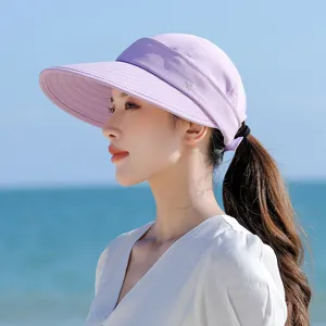 Closeup view of a stylish light purple empty-top sun visor hat, perfect for outdoor summer wear.