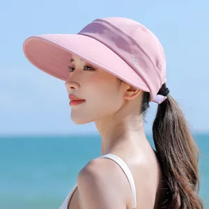 Pink sun visor hat detail, wide brim empty top design for women outdoor summer sun protection.