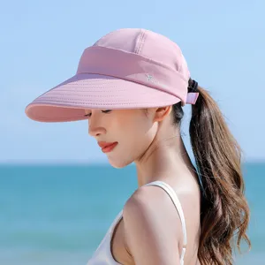 Stylish pink wide-brim sun visor hat for women, perfect for outdoor summer UV protection.