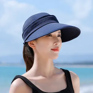 Detailed view of the women's navy blue wide-brim empty-top sun hat, outdoor sun protection.