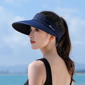 Detailed view of the women's dark blue empty top sun visor hat, showing breathable fabric and brim.